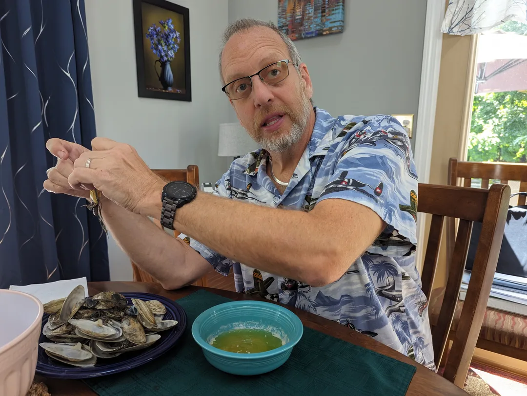 A man eating Ipswich clams