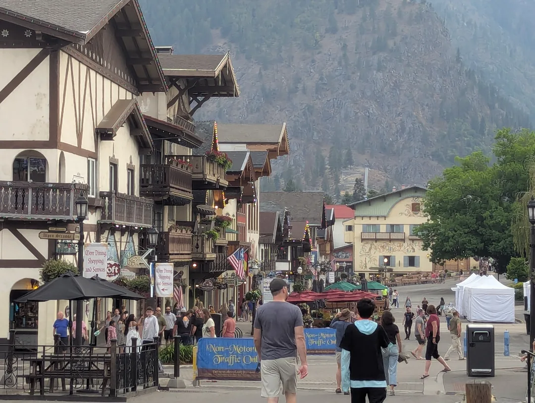 People walking past German buildings in Leavenworth, Washington