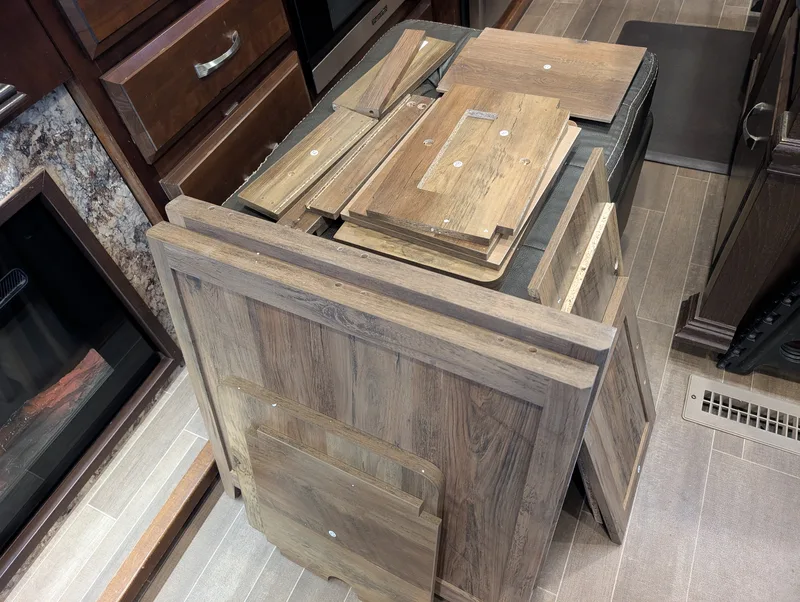 Wooden pieces of an disassembled table