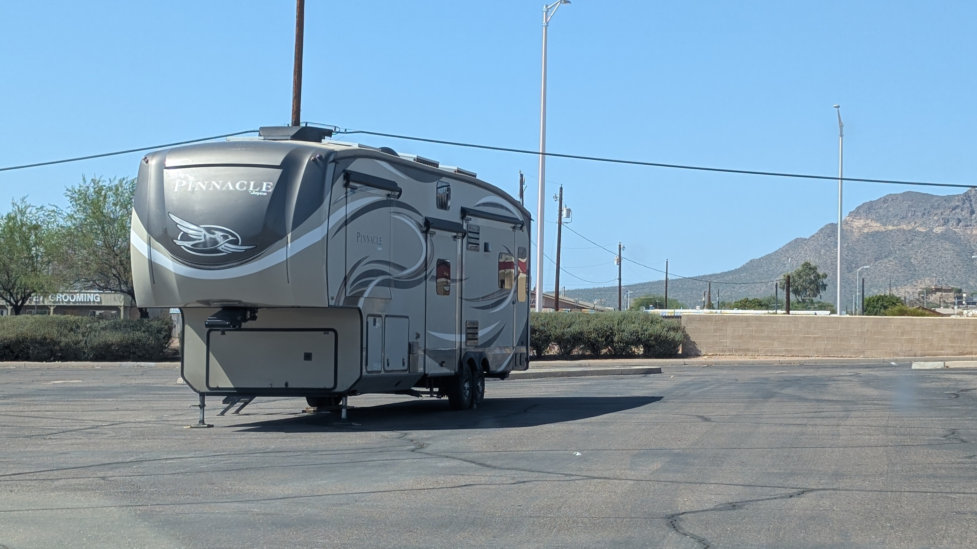 Fifth-wheel RV in a parking lot