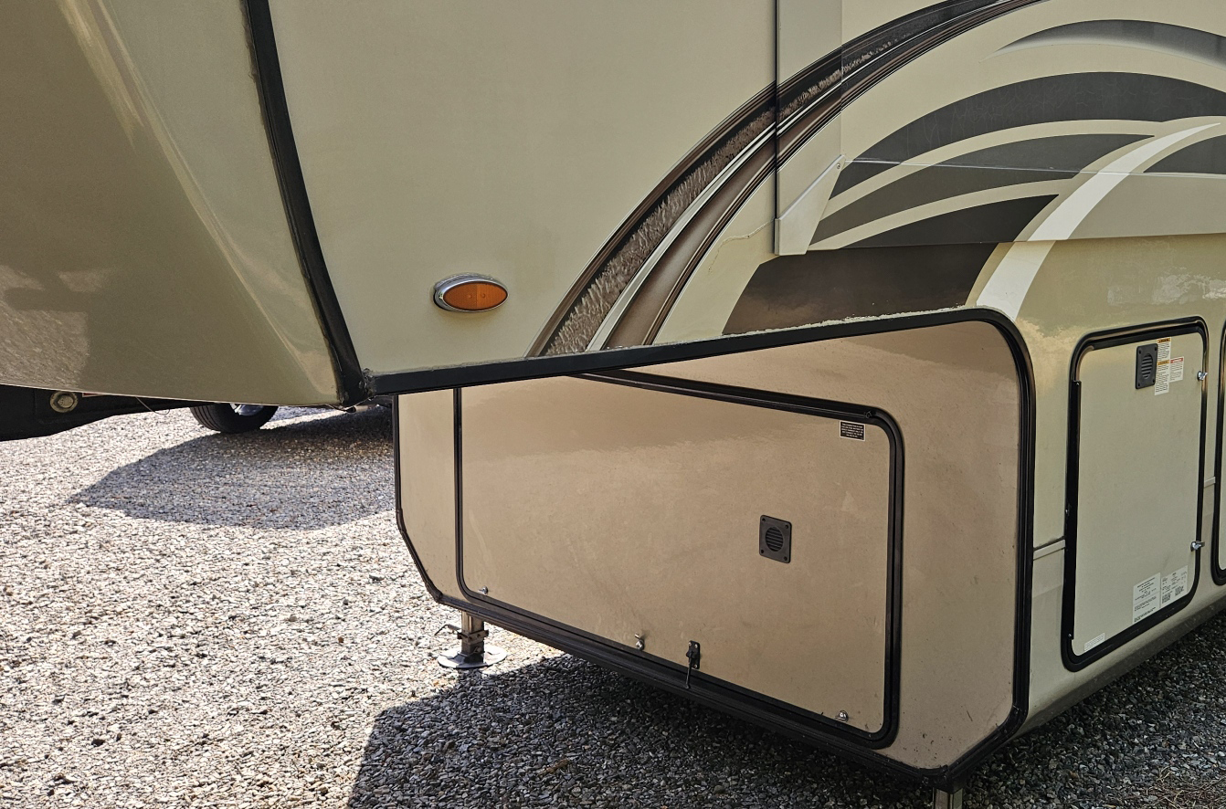 Side view of a fifth wheel showing trim